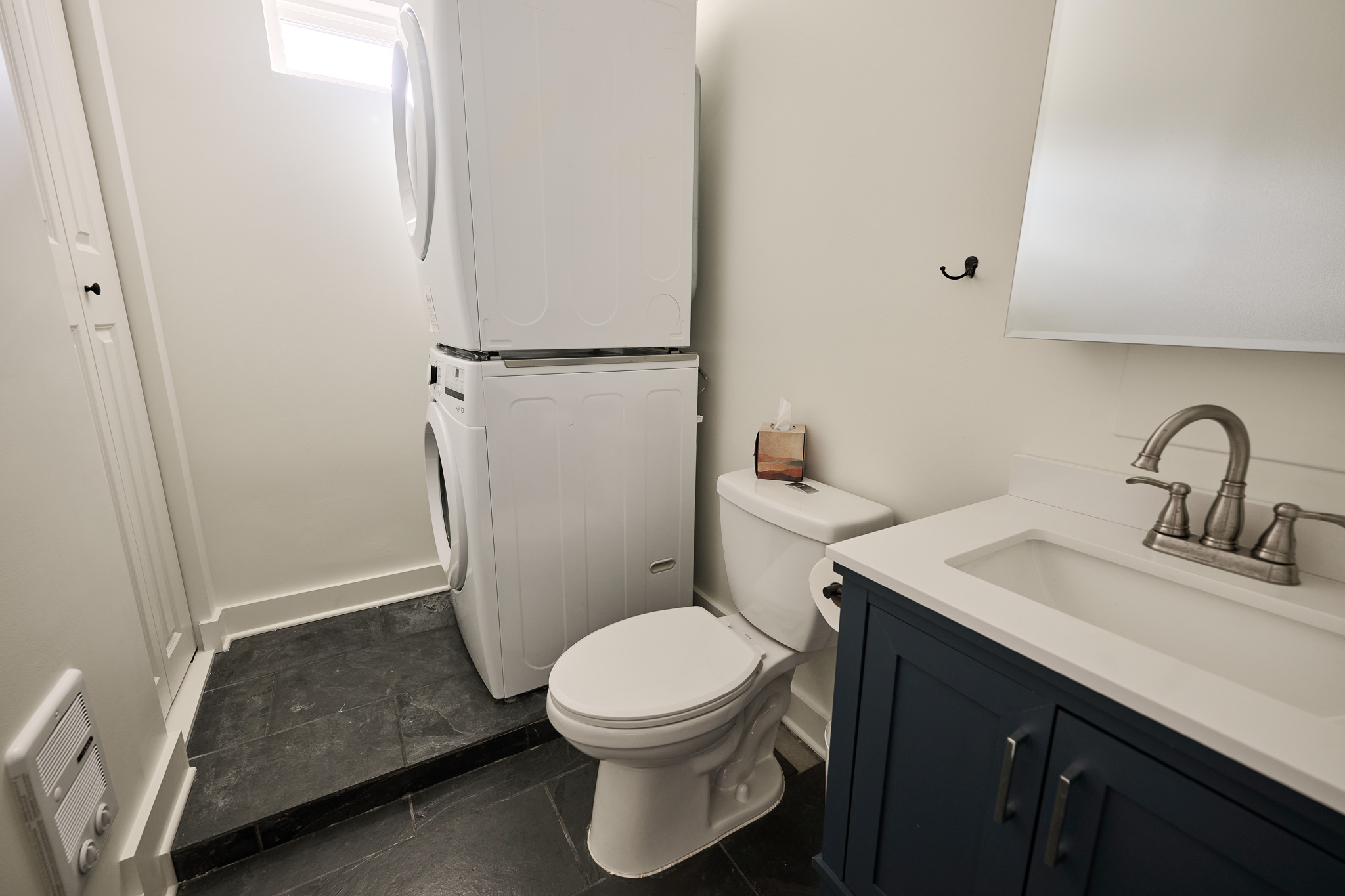 Half bath and laundry off the kitchen