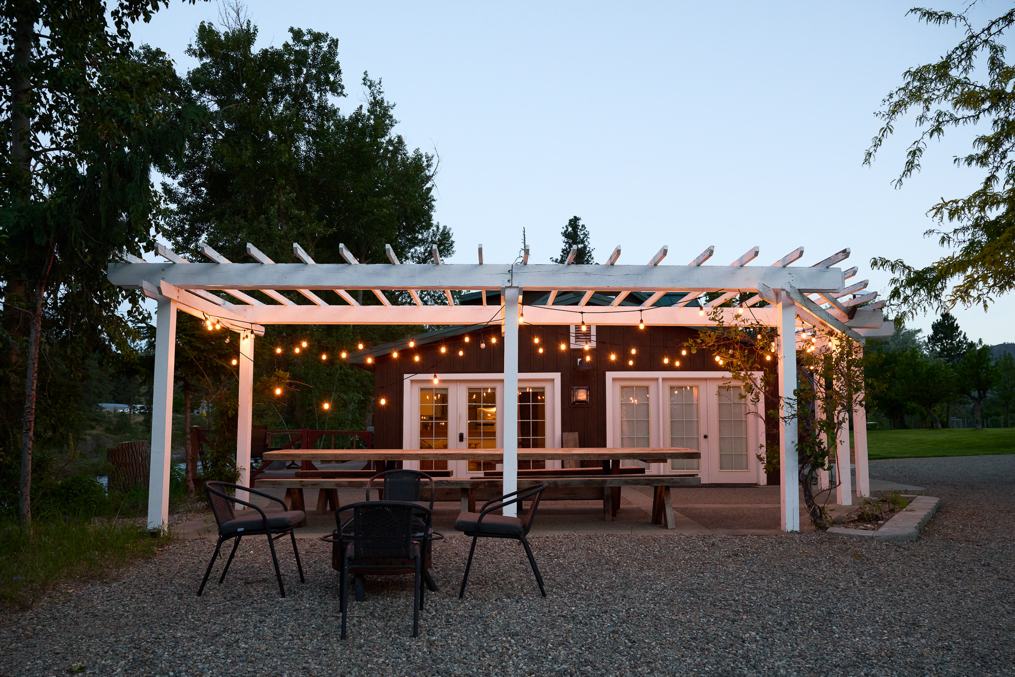Pergola with string lights at dusk